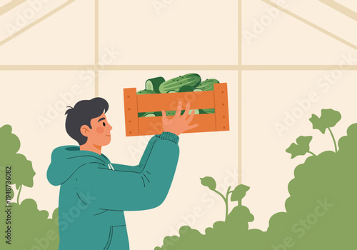 A young man proudly displays a crate of freshly harvested cucumbers in a youth garden. Vibrant greens and a clear, inviting setting.