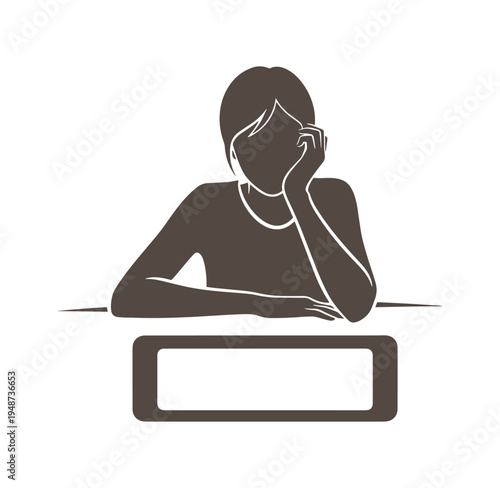 woman sitting at a desk looking stressed or bored with her head on her hand