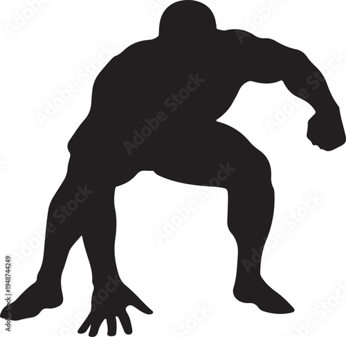 Silhouette of a Muscular Man in a Powerful Crouched Stance