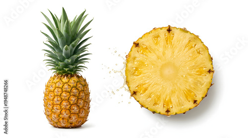 A whole pineapple stands beside a fresh cross-section slice with juice droplets splashing between them.