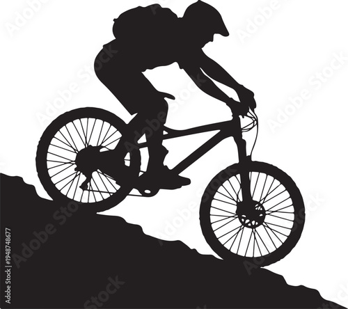 Silhouette of a Mountain Biker Descending Down a Steep Rocky Slope