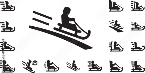 Silhouette of a person sledding down a snowy hill