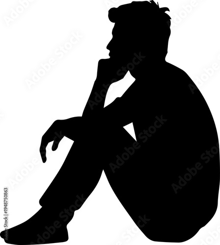 Silhouette of a Pensive Man Sitting and Thinking