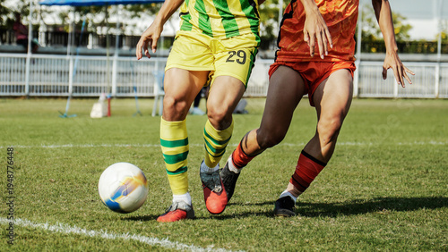 Intense football competition: Players battling for possession on a stadium pitch