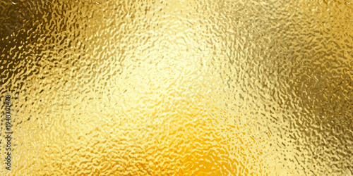 A shimmering textured gold background with a bright central highlight and deep shadows creating a luxurious and opulent visual effect