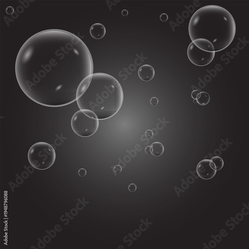 A collection of translucent soap bubbles floating against a dark grey gradient background effect