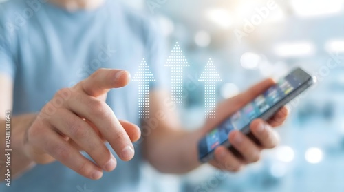 Man holding smartphone with upward arrows in bright modern lighting for financial growth.