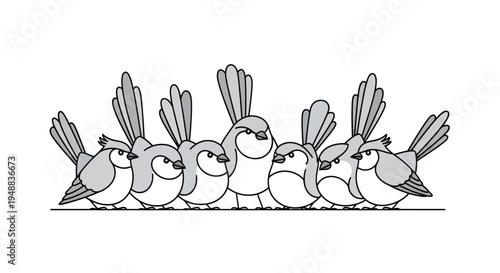 Group of small birds standing together.