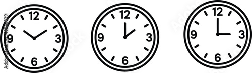 Three analog clocks displaying different times in a row