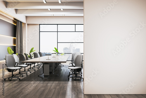 Modern conference room interior featuring long meeting table, ergonomic chairs, bright windows, plants and wide blank wall ideal for clean corporate mockup display. 3D Rendering