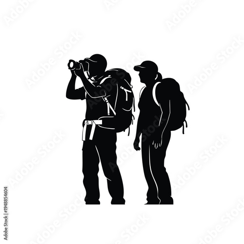 Man and woman hikers silhouette with backpacks looking through binoculars
