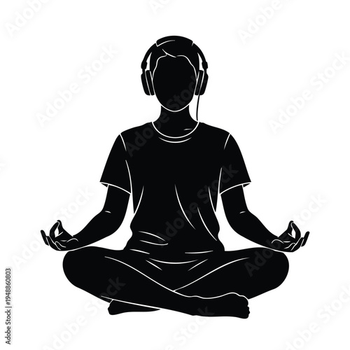 Person meditating in lotus position wearing headphones silhouette zen