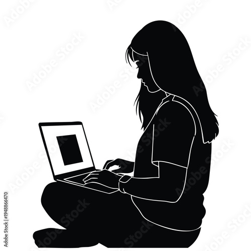 Silhouette of girl sitting cross-legged using laptop computer