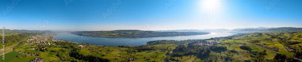 Fototapeta premium Aerial panorama of Lake Zurich, with views of Horgen and the Au Peninsula