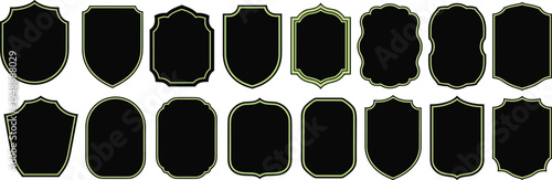 Collection of black and gold decorative shield and crest shapes with various intricate borders