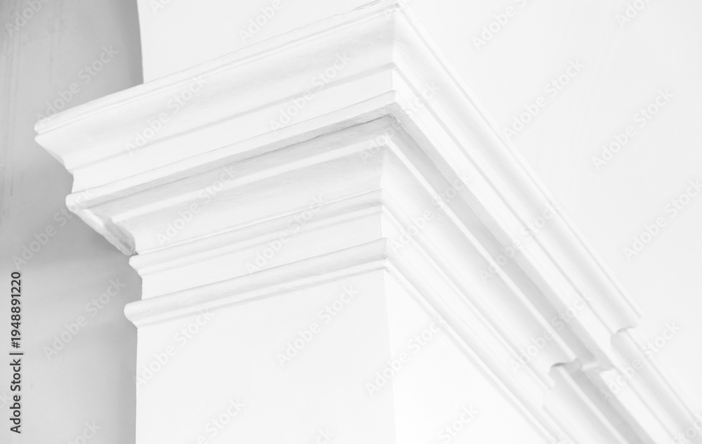 Obraz premium Detailed image of an intricately designed white cornice, abstract white architectural background photo