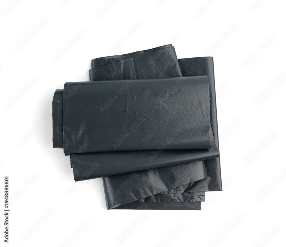 Fototapeta premium Garbage Bag Isolated. Folded Trash Package, New Rolled Plastic Bin Bags, Black Polyethylene Container