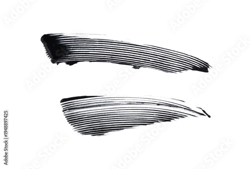 Fotografie Mascara brush stroke isolated. Black eyelash makeup smudge