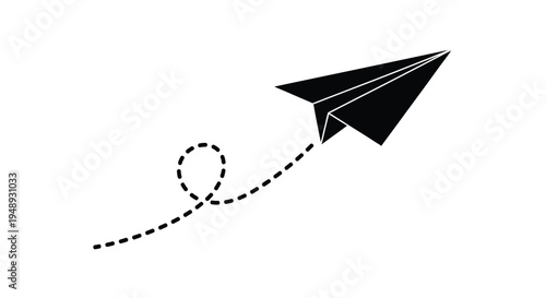 A black paper airplane in flight with a dotted path silhouette