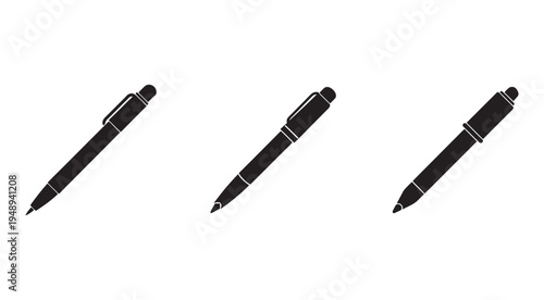 Three black pens with silver accents in different angles for writing and drawing isolated on white background