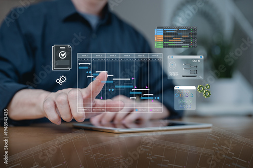 Businessman working with Time management project planning, Project manager updating tasks and milestones progress planning with Gantt chart scheduling interface on a virtual screen