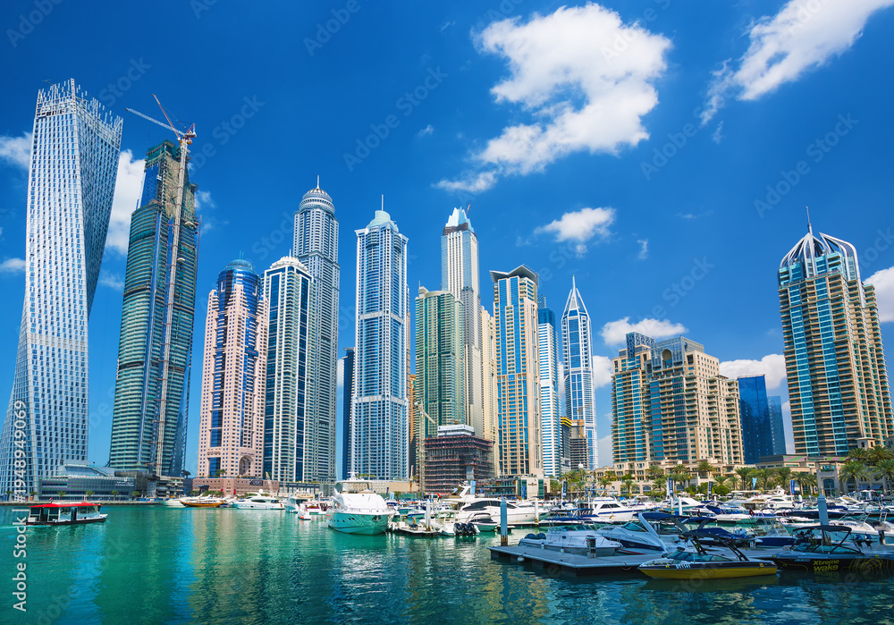 Fototapeta premium Aerial View of Dubai Marina Skyline, Luxury Waterfront Hotels and Residential Towers, UAE