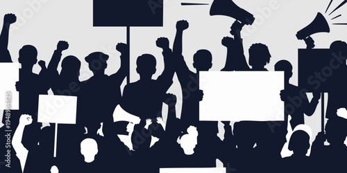 People protest with signs and megaphones in a crowd demonstration.