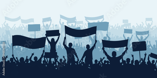 A crowd of people protest with flags and signs in a public square at night.