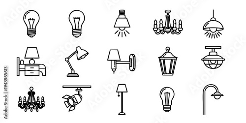 Various lamps and light fixtures are arranged on a table indoors.