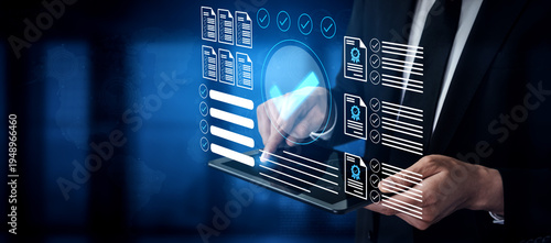 Tableau sur toile A businessman utilizes a cutting-edge digital interface to analyze data and manage documents in a corporate setting, showcasing modern technology in action