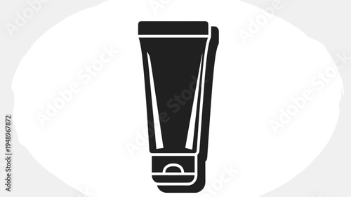 Silhouette style icon of a makeup or skincare tube for lotion or cream products presented with a drop shadow effect.