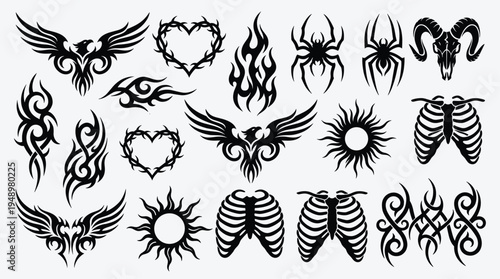 Black tribal eagle, heart, spider, sun, and skeleton rib cage elements gathered together in a collection of symbols against a plain white background