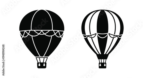 Two hot air balloons in contrasting black and white designs