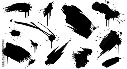 Brush strokes set with black ink splatters and grunge textures on white background featuring artistic effects, abstract