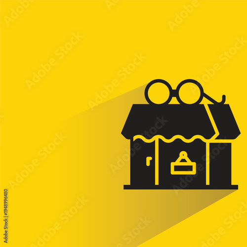 eyeglass shop icon with shadow on yellow background