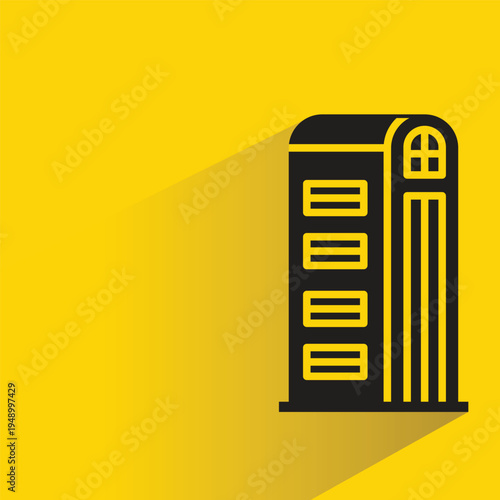 apartment and office tower icon with shadow on yellow background