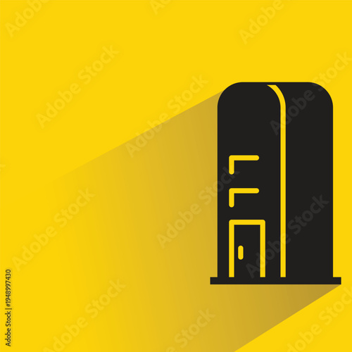 apartment and office tower icon with shadow on yellow background