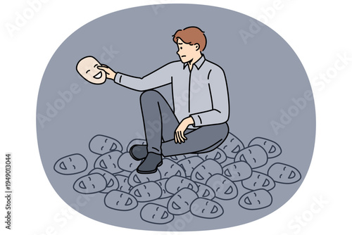Masks with fake smile around man who uses hypocrisy to communicate with colleagues on daily basis. Young business guy sits among masks, and is sad due to having honest positive emotions