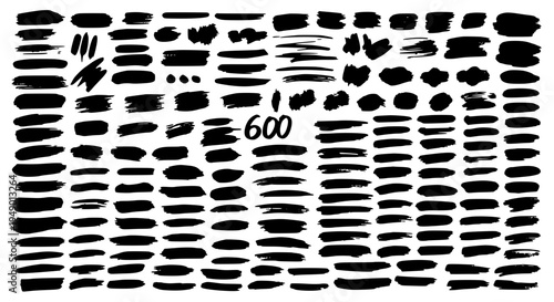 Brush strokes black abstract pattern with irregular shapes and 600 text featuring artistic, hand drawn, graphic with