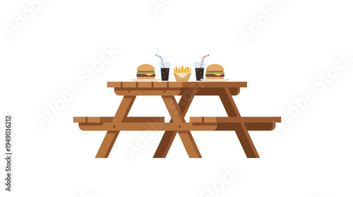 Wooden picnic table with food.