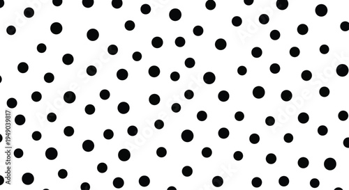 Abstract pattern of random black dots of varying sizes creating a minimalist and modern graphic background or design element