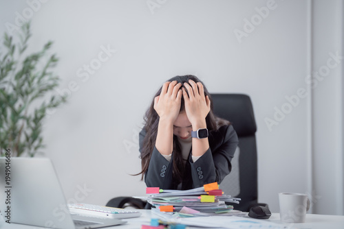 Bilde på lerret Stressed young businesswoman burying her head in hands, experiencing burnout and