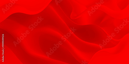 A luxury red silk and satin fabric background features a smooth flowing wave texture with elegant shiny curves and soft textile material for a decorative velvet backdrop pattern