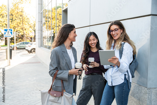 Businesswomen collaborating outside with confidence