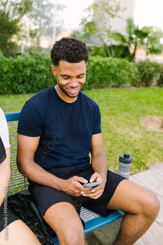 Man enjoying a break on a park bench