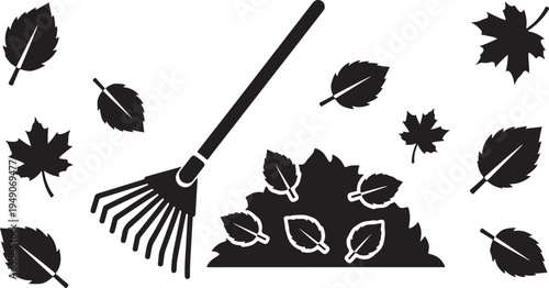 Raking leaves into a pile with a garden tool