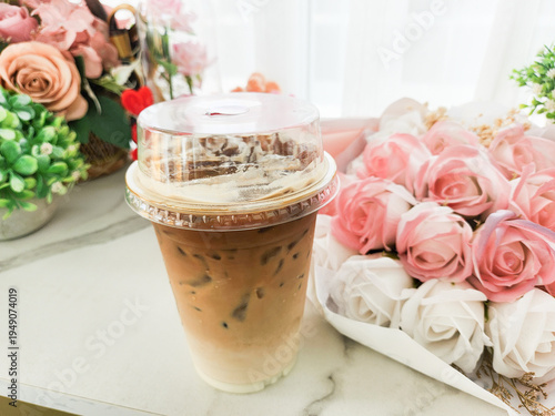 Iced coffee and rose flower