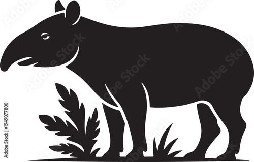 Black Silhouette of a Tapir Standing in Grass and Leaves