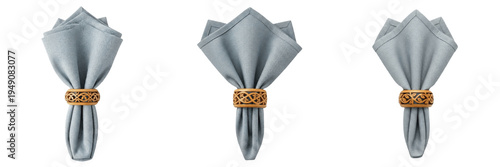 Elegant grey fabric napkin in a decorative wooden napkin ring