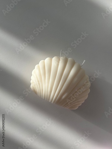 Shell candle made by hand from natural soy wax